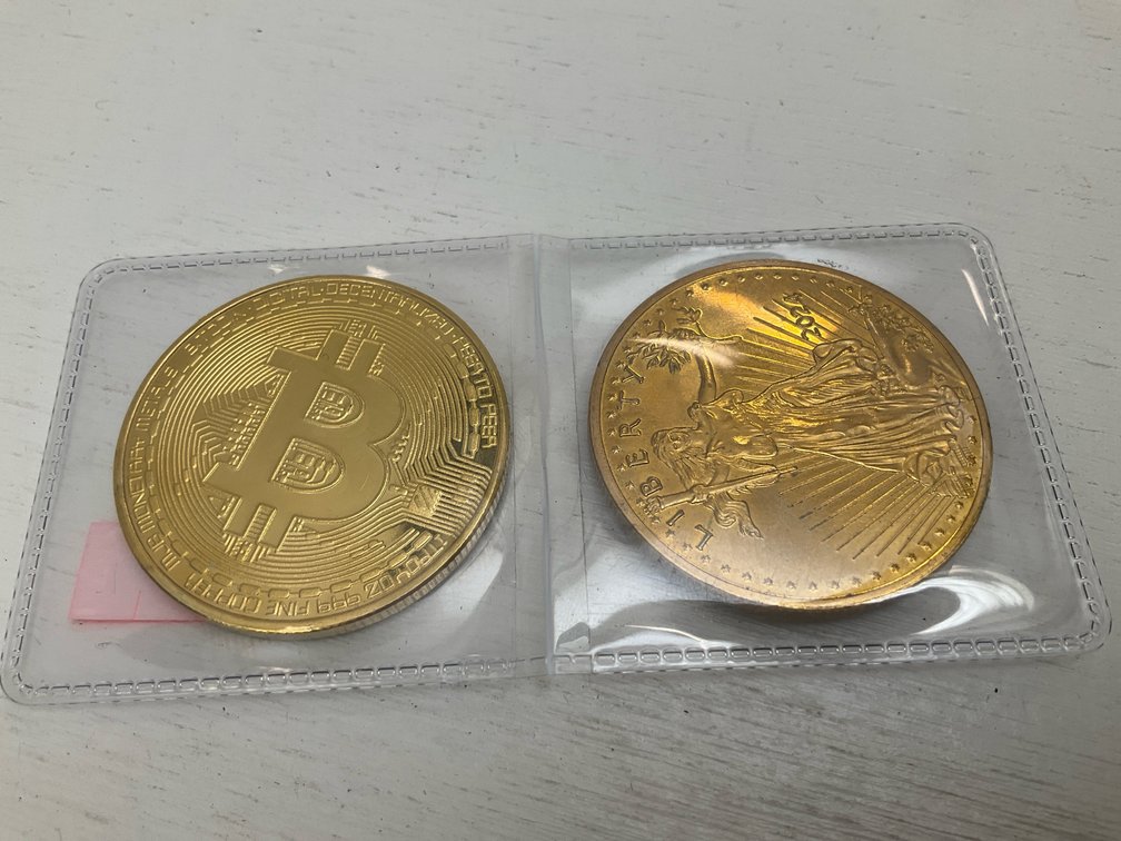 (2) 1 oz brass replica rounds
