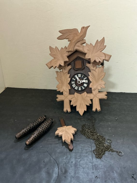 Carved wood cuckoo clock with weights & pendulum
