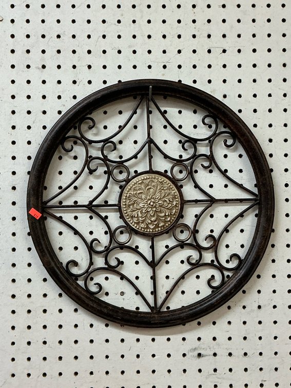 Circular metal scrollwork wall decor