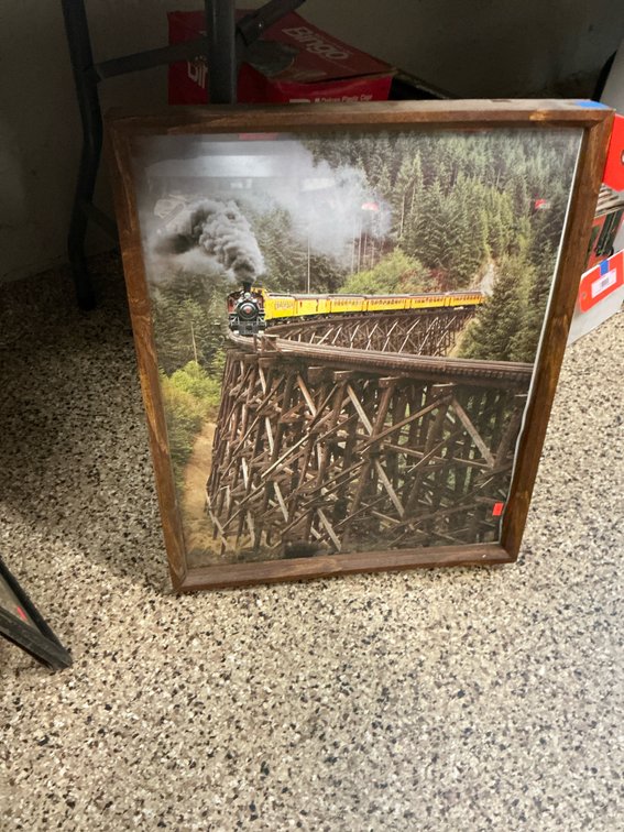 Framed steam train on trestle bridge photograph