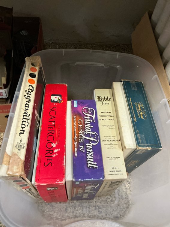 Grouping of 5 board games with plastic storage tote