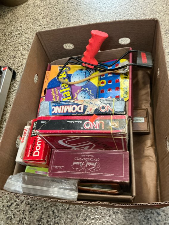 Assorted board games, dominoes, travel games & slingshot