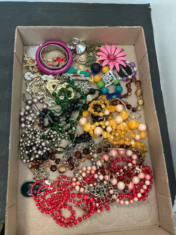 Grouping of costume jewelry necklaces, bracelets & brooches