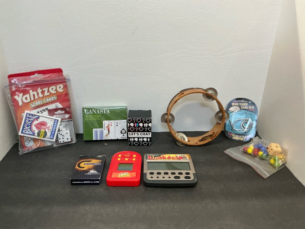Grouping of tabletop games, handheld games & tambourine