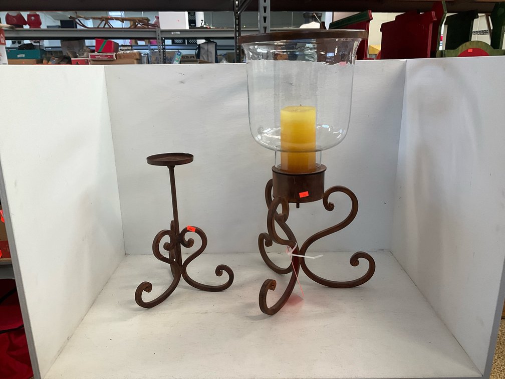 2 wrought metal candle stands, 1 with hurricane shade
