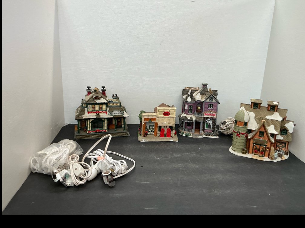 Holiday village buildings with light cords