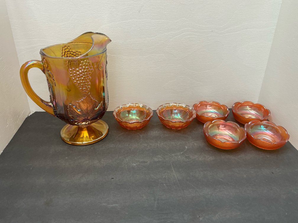 Marigold carnival glass pitcher & bowls set