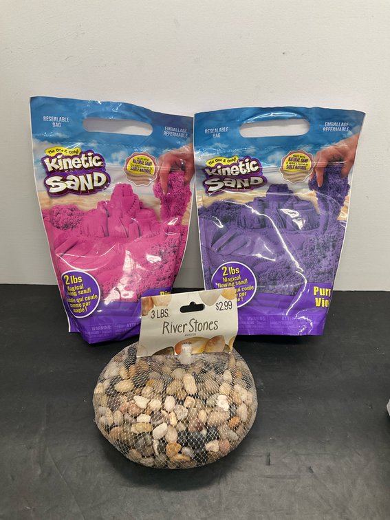 2 bags of Kinetic play sand & 3 lb bag of river stones