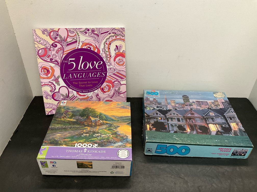 Grouping of 2 jigsaw puzzles & adult coloring book