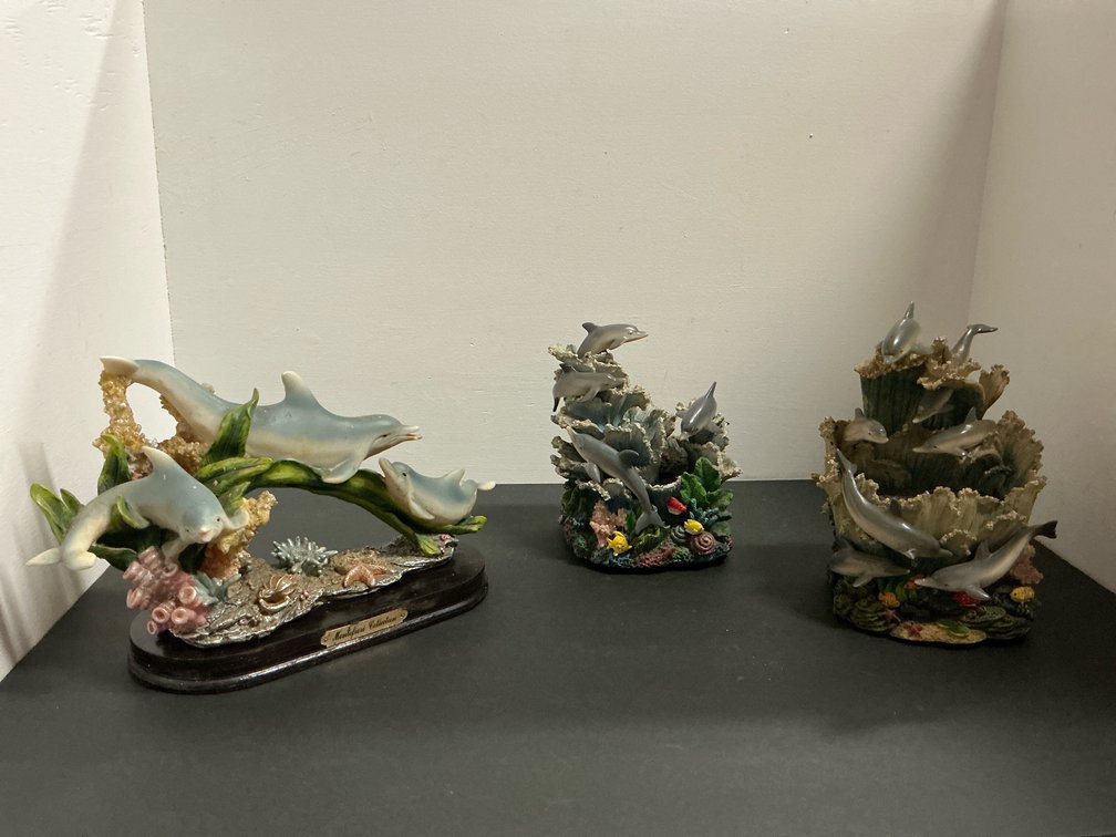 Grouping of 3 cast resin dolphin figurines