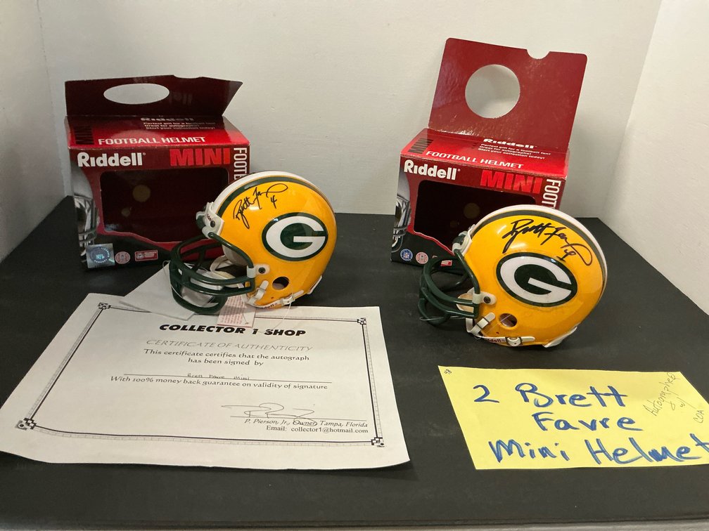 2 Riddell Brett Favre autographed Packers mini helmets