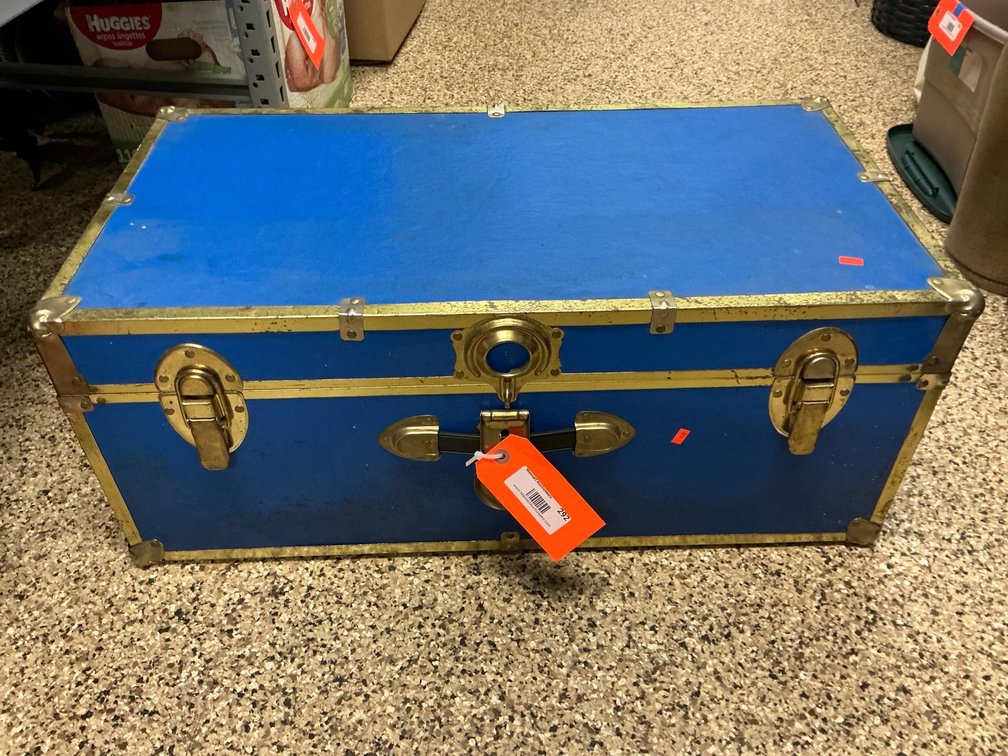 Blue footlocker trunk with brass-tone trim