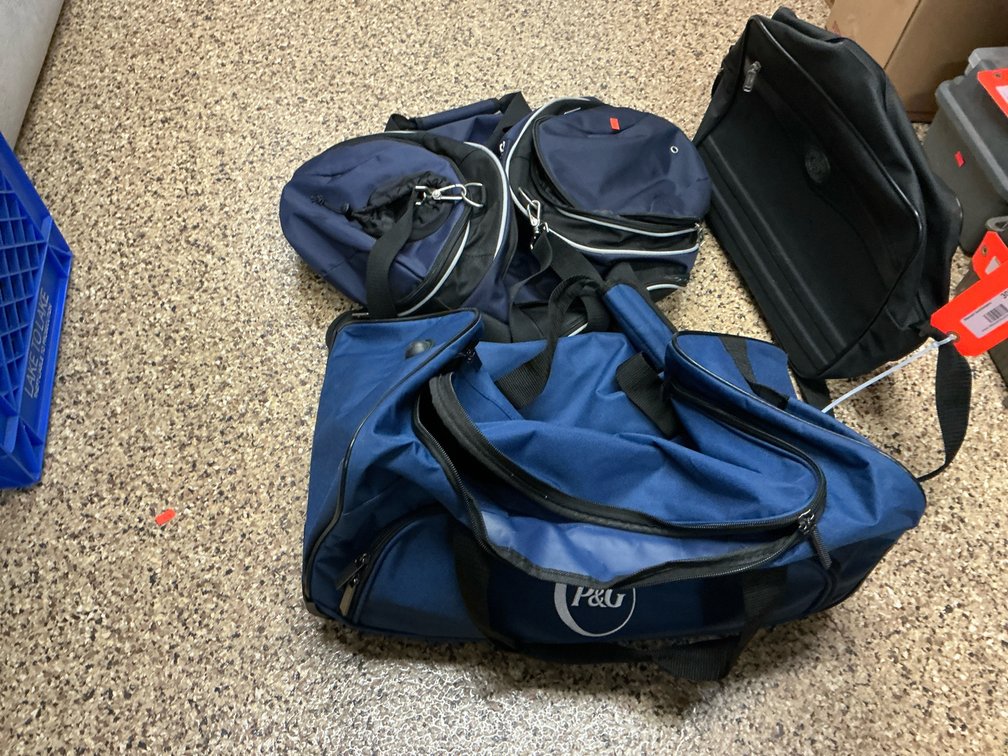 Grouping of rolling duffel, duffel & shoulder bags
