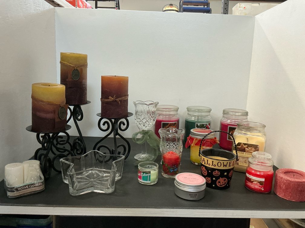 Assorted candles & candle holders with metal stands