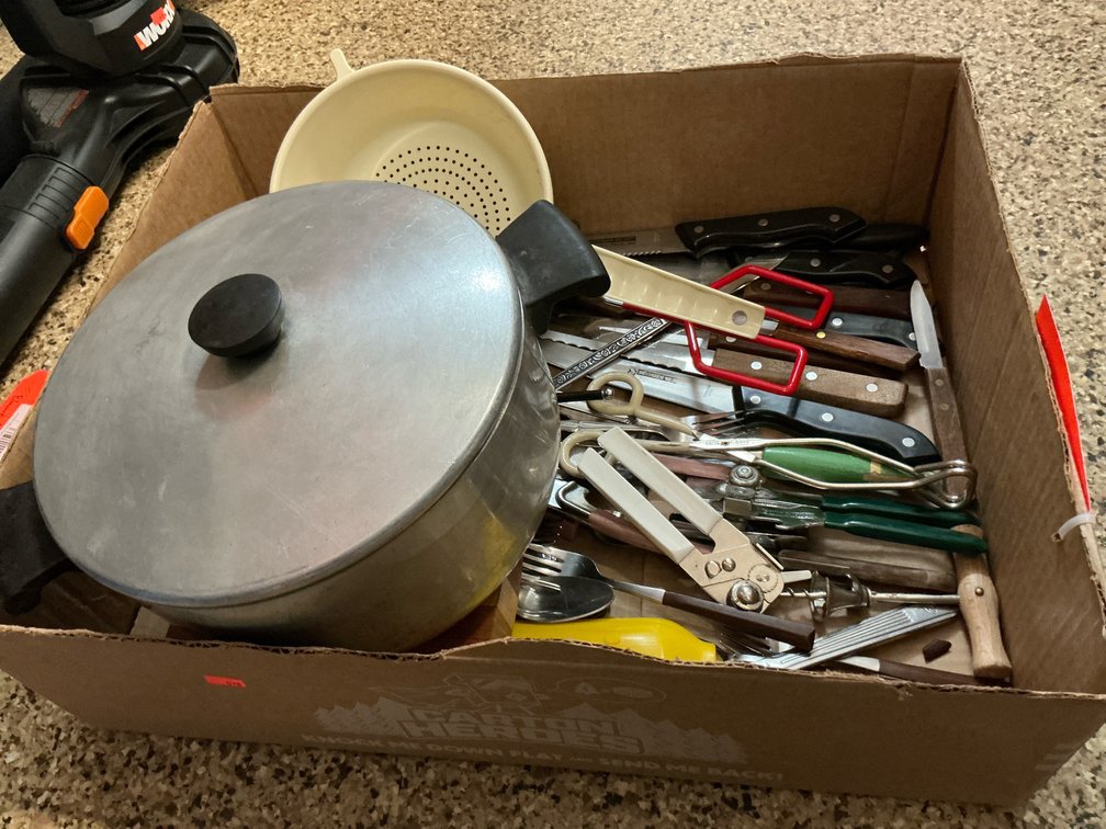 Aluminum Dutch oven, cutting board, colander & utensils