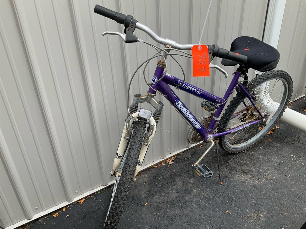 Roadmaster purple mountain bicycle with front suspension
