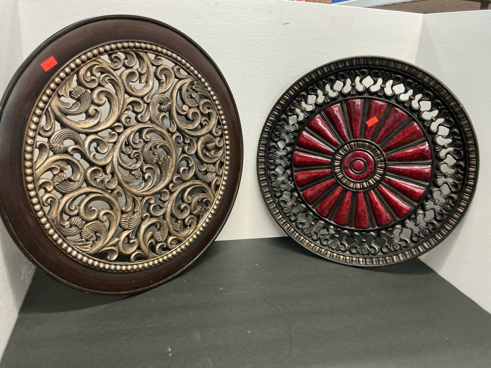 Pair of round decorative wall medallions