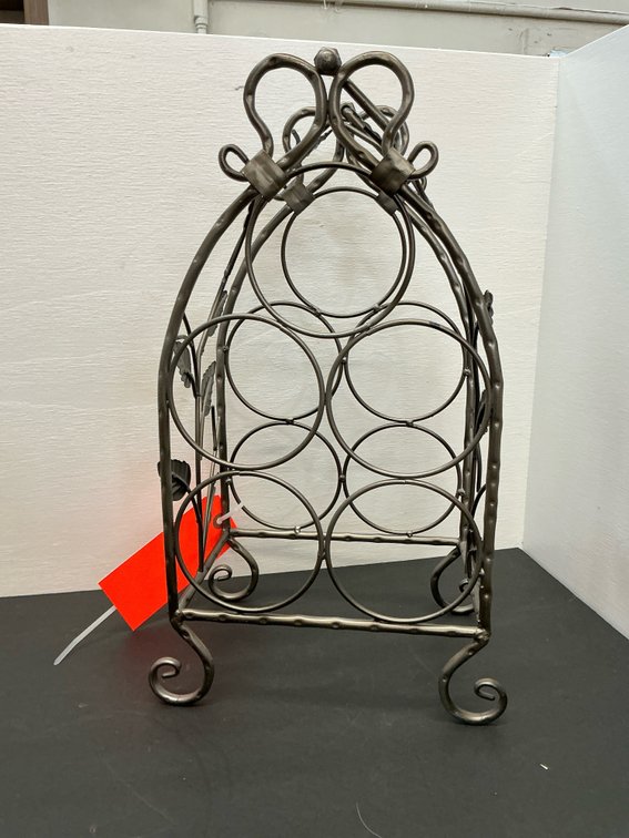 Dark metal 5-bottle wine rack with leaf motif