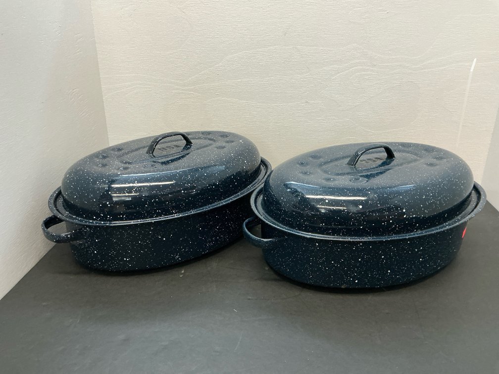 2 blue speckled enamelware oval roasting pans with lids