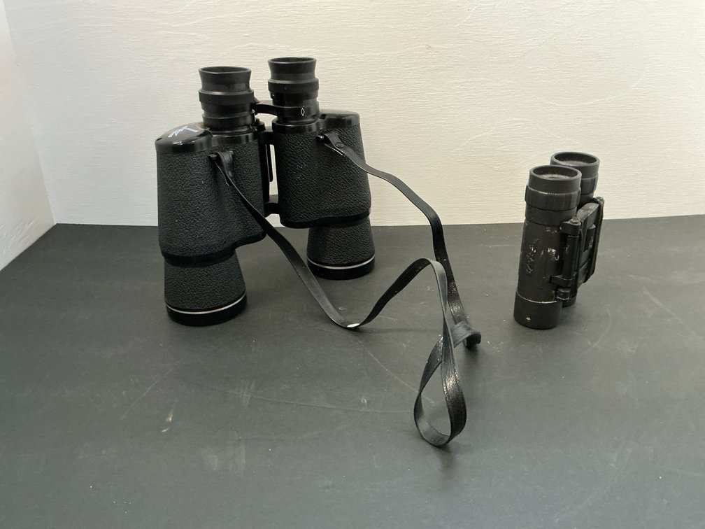 2 pairs of black binoculars with neck straps