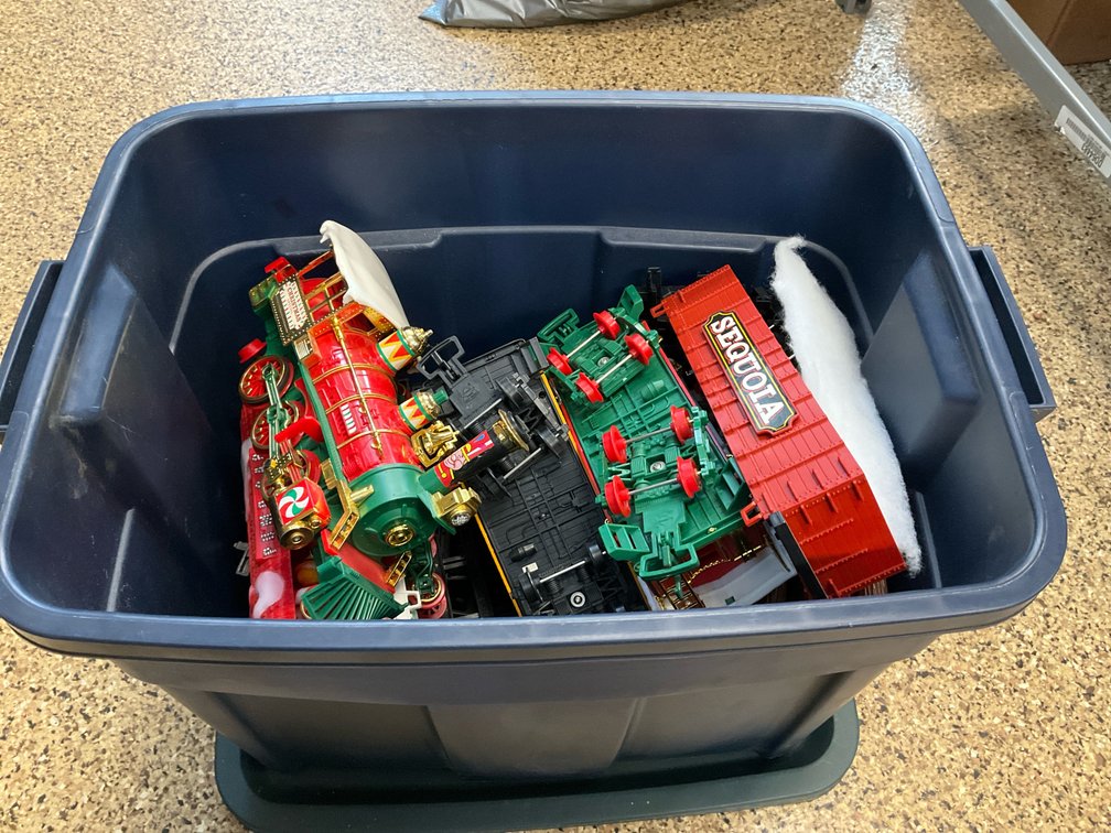 Christmas toy train cars, tracks & accessories in tote
