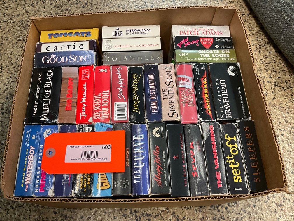 Grouping of 33 assorted VHS movie tapes