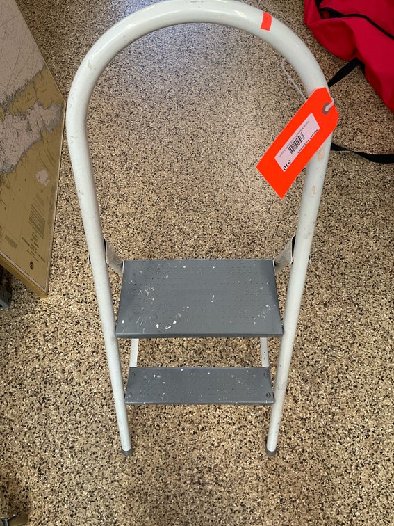 White tubular metal folding 2-step stool