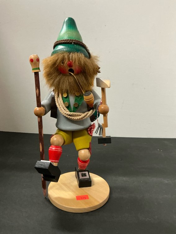 Carved wood mountaineer incense smoker figurine