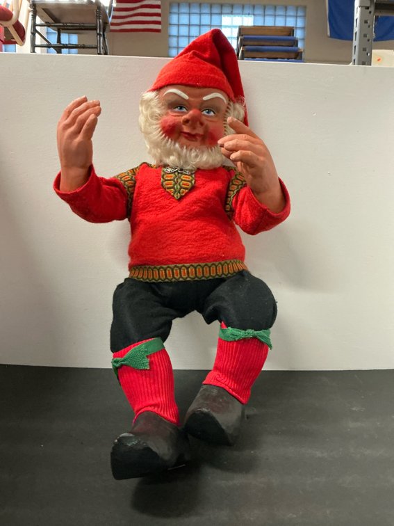 Seated gnome figure in red sweater & cap, Marked "Arne Hasle Askim Norge" on sole.