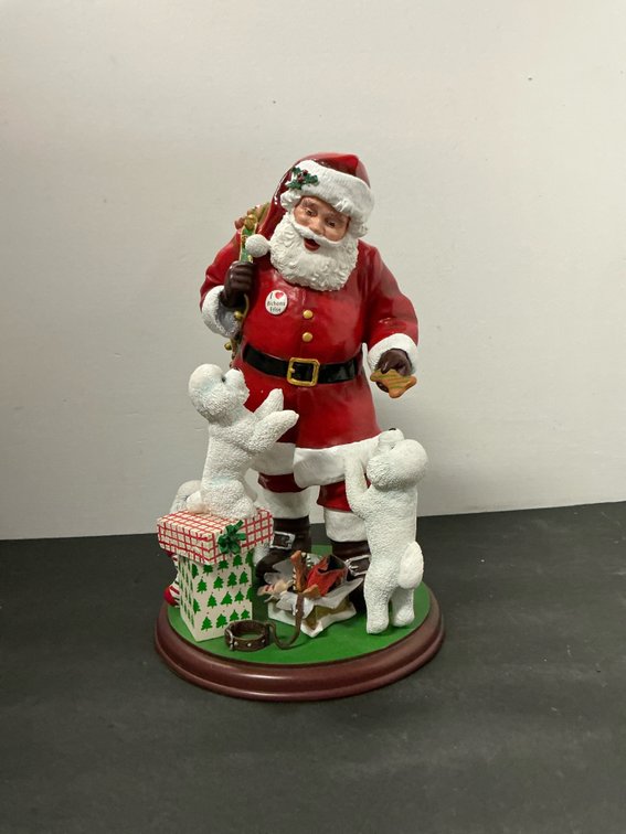 Painted Santa Claus figurine with Bichon Frise dogs 10” tall