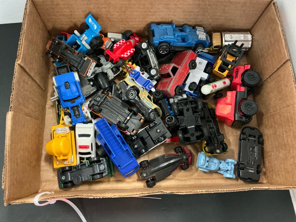 Assorted die-cast & plastic toy vehicles