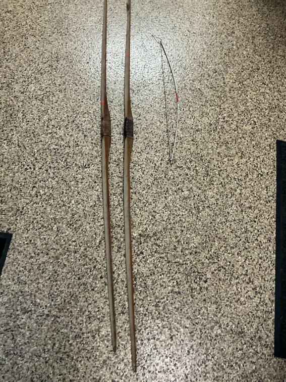 2 wooden archery bows & 1 miniature wire bow