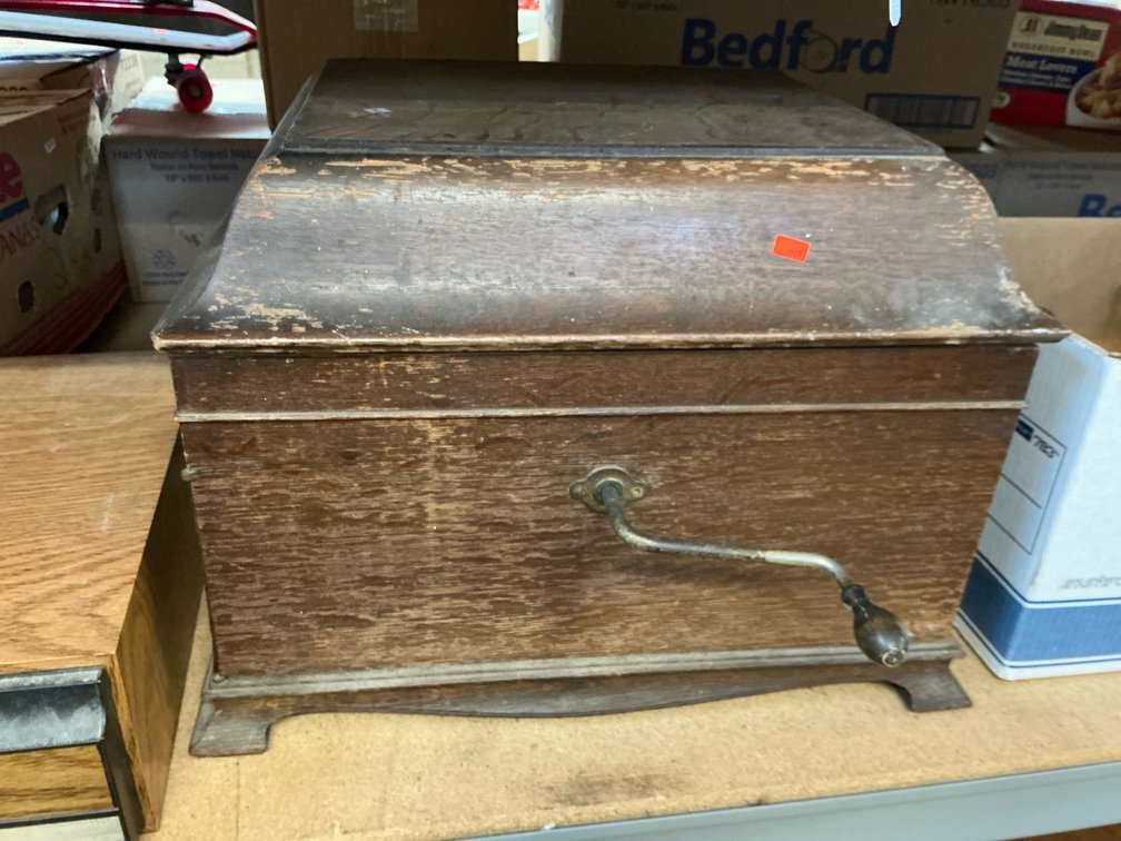Oak tabletop phonograph cabinet with hand crank