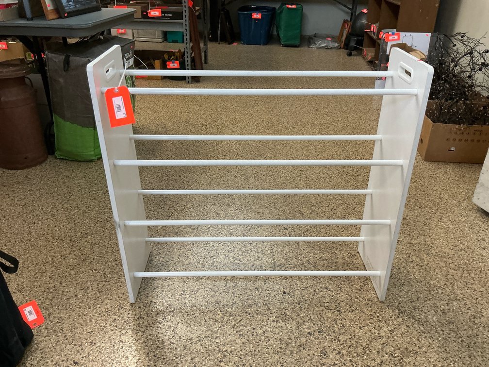 White four-tier rod storage rack with cutout handles