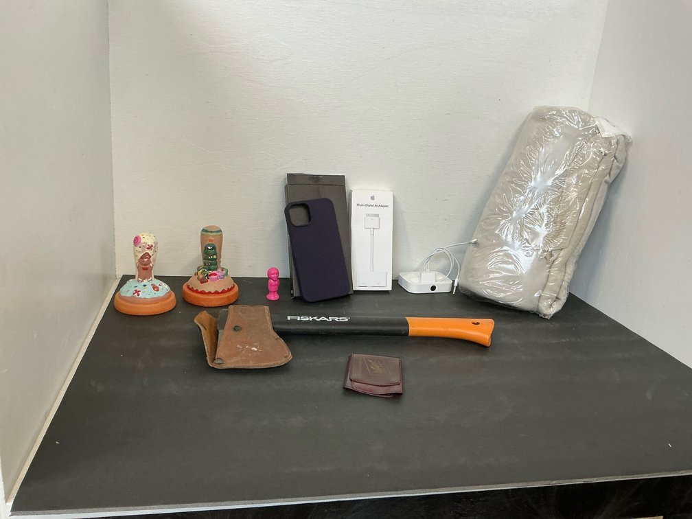 Grouping of hatchet, electronics accessories & more
