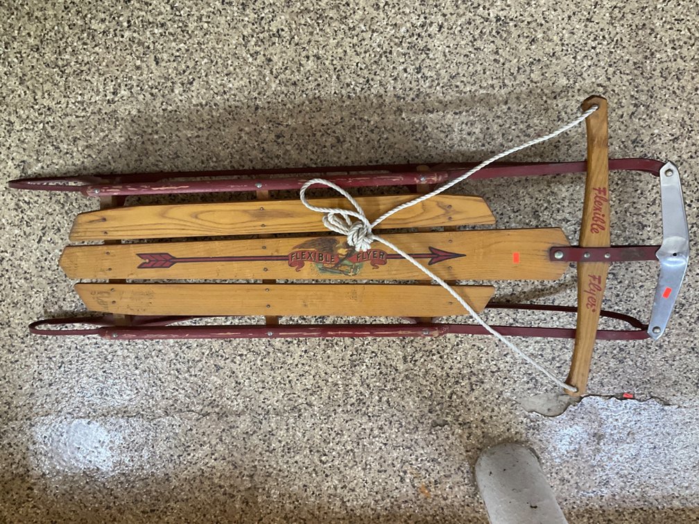 Flexible Flyer wooden sled with pull rope