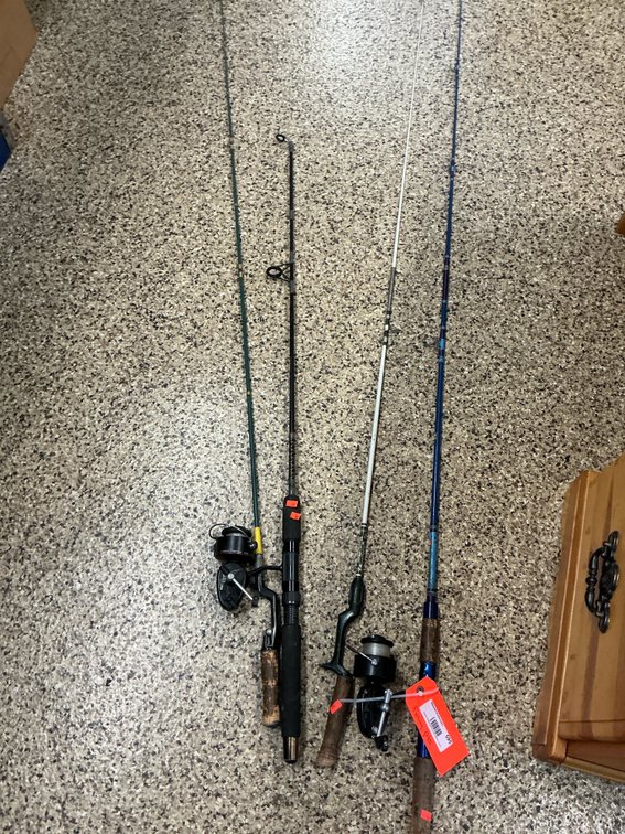 4 fishing rods with reels