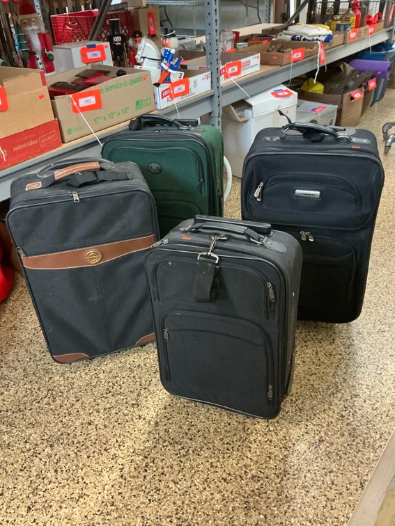 4 softside rolling suitcases in black & green
