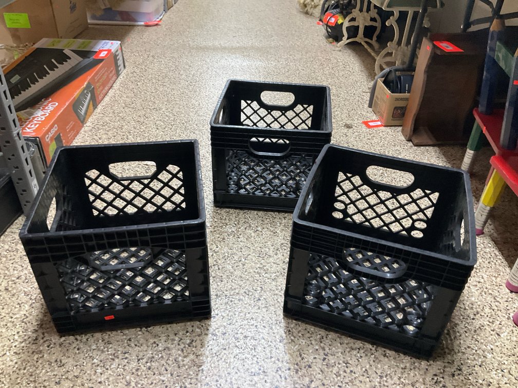 3 black plastic milk crates with integrated handles