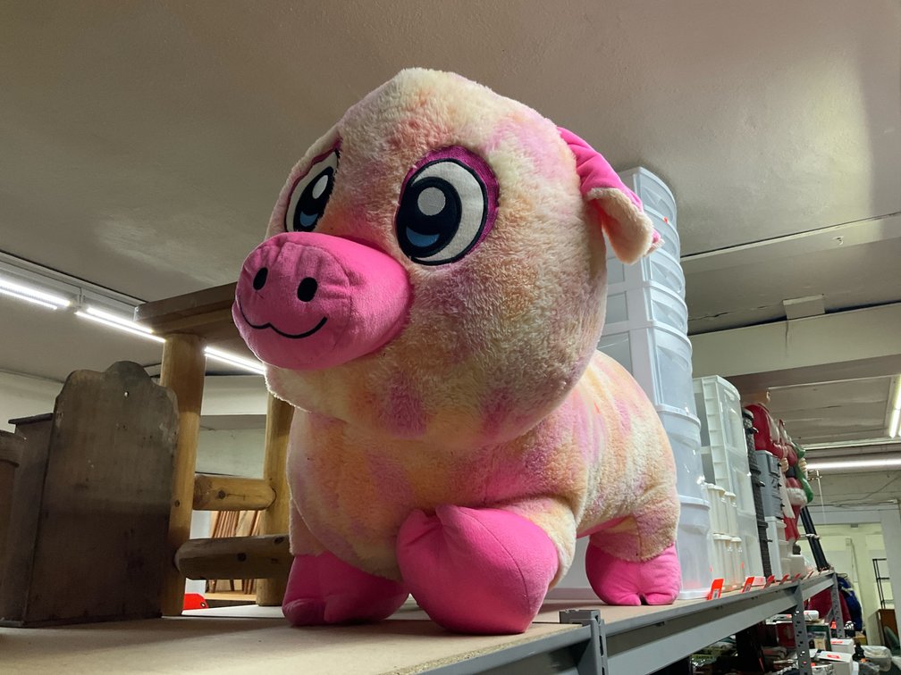 Large pink and yellow tie-dye plush pig