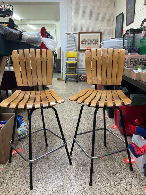 Pair of wooden slat swivel barstools