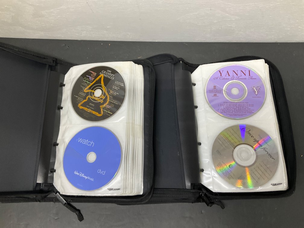 2 Case Logic zippered CD binders with compact discs