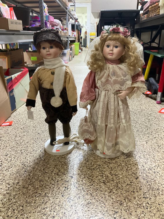 Pair of animated boy & girl display dolls 25” tall
