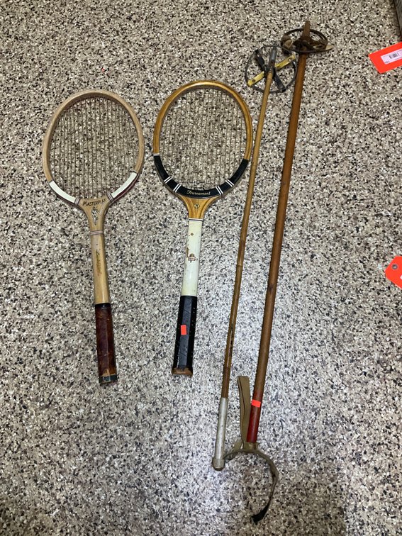 Grouping of wooden tennis rackets & ski poles