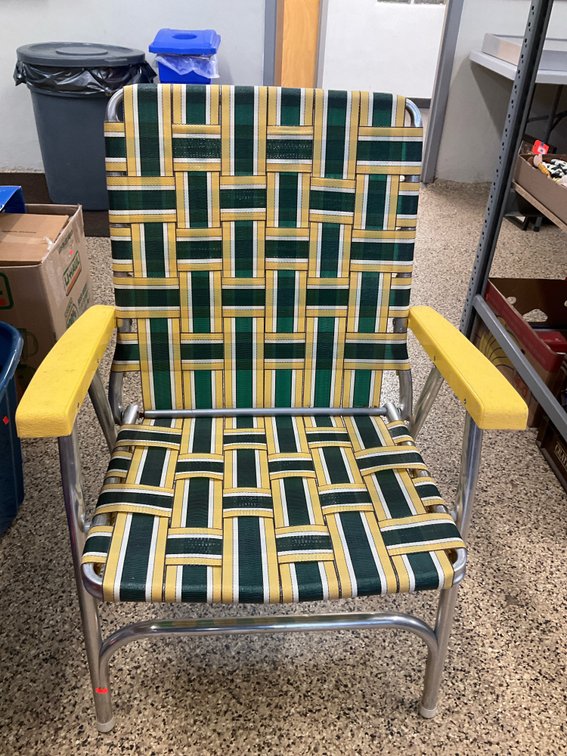 Folding lawn chair with green & yellow webbing