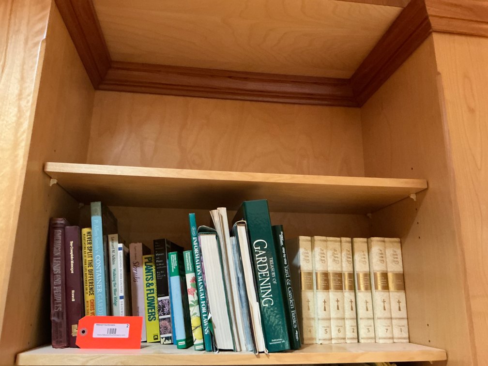 Assorted gardening books & The Catholic Home Library - Office Main Level