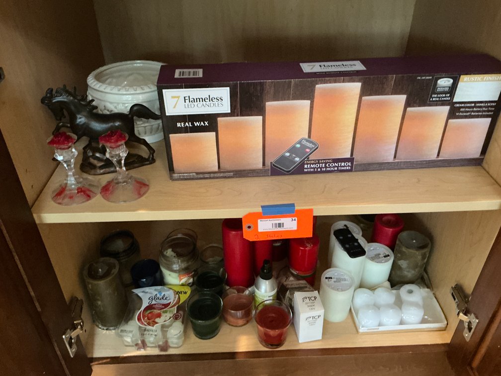 Contents on 2 shelves-Assorted candles, flameless LED set & home decor - Living Room Main Level