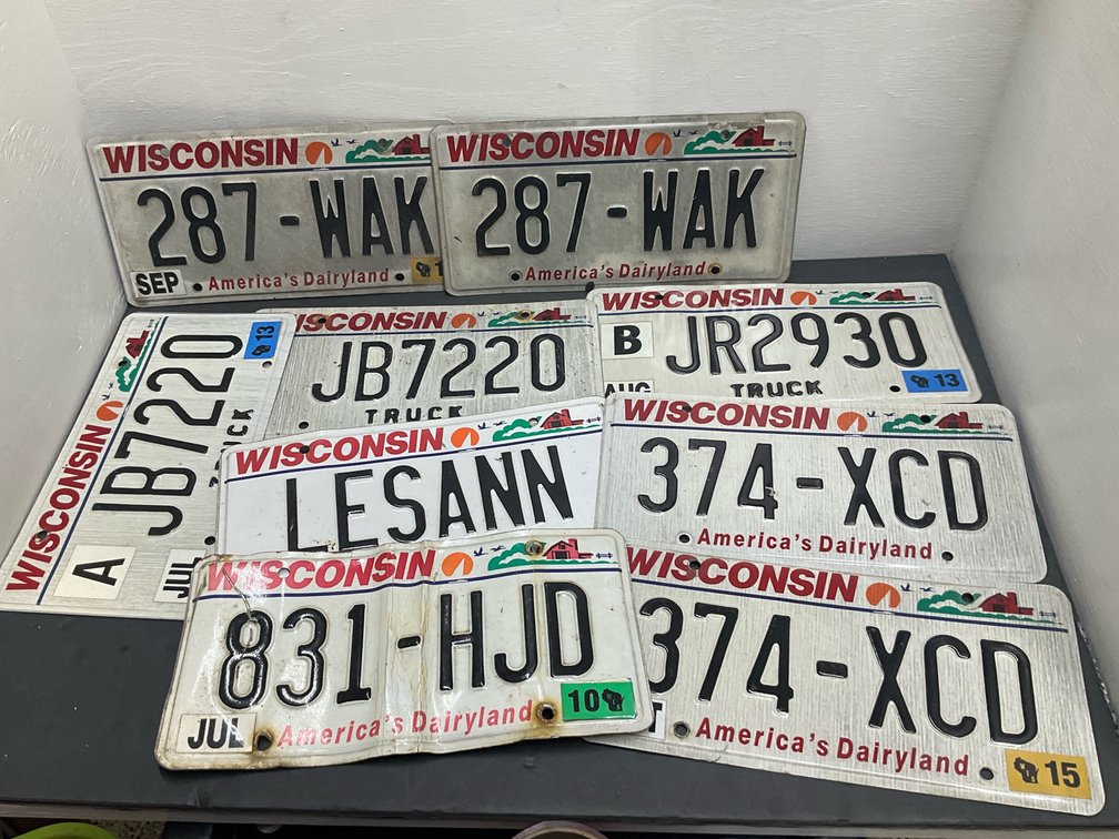 Grouping of Wisconsin metal license plates