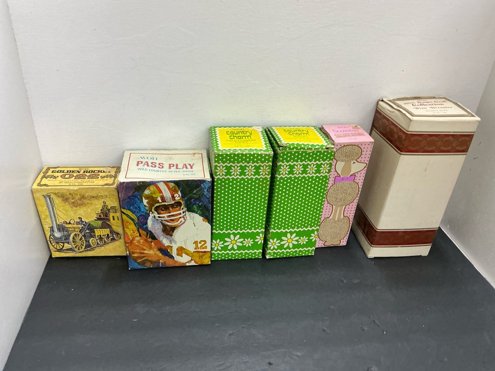 Group of Avon collectible boxes with Cape Cod glass decanter