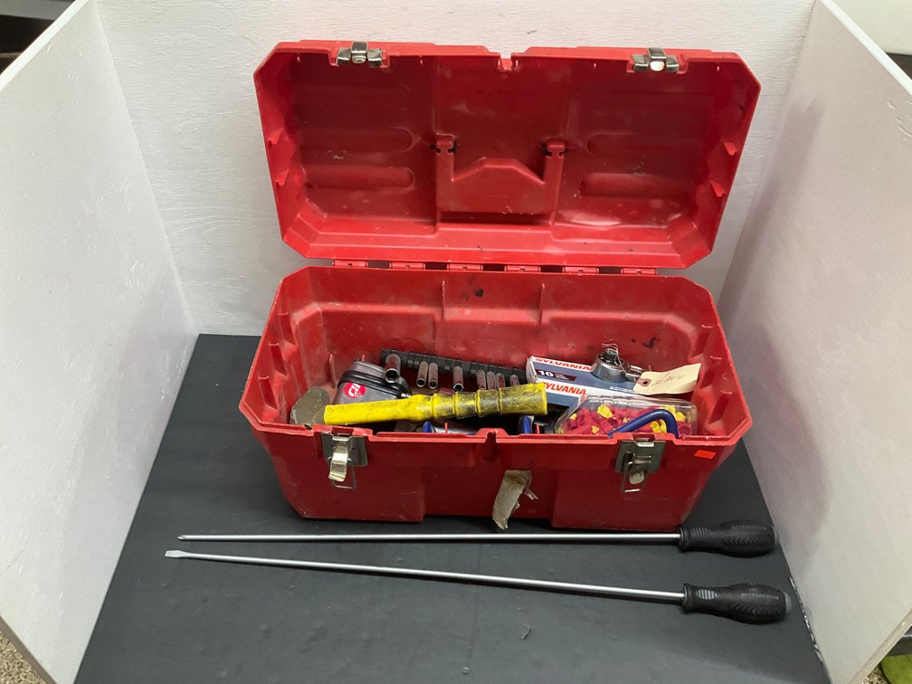 Red plastic toolbox with assorted hand & air tools